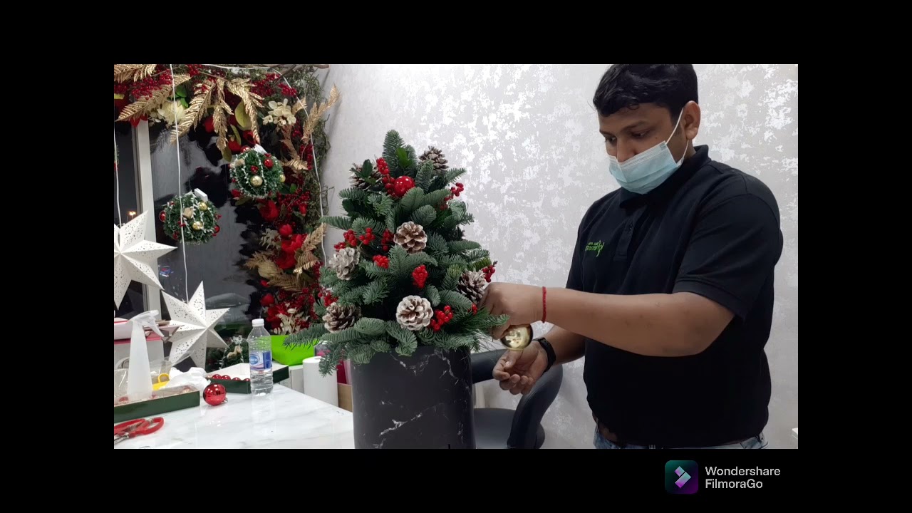 fresh Christmas tree arrangement fresh leaves making prasenjit das #flowerDesignerpd #flower #dubai