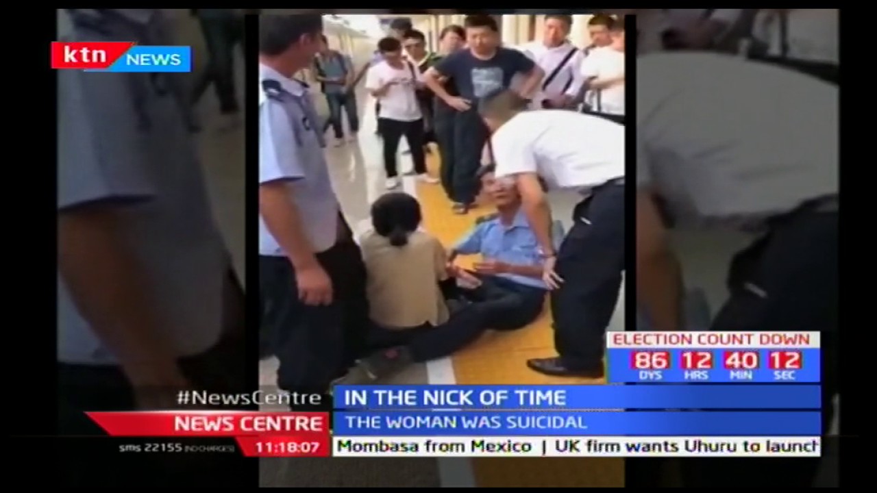 Woman saved after she tried to commit suicide at a railway station