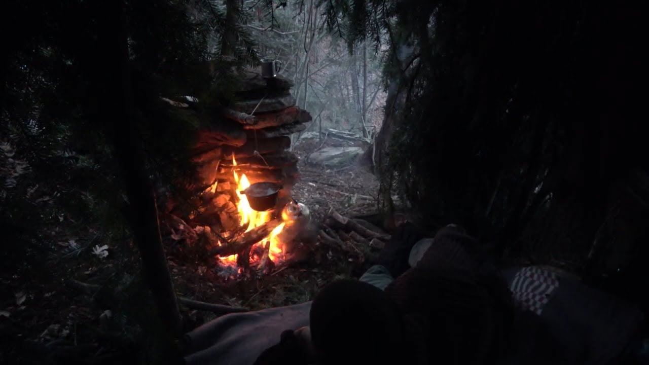 Learn how to build an inconspicuous shelter. Camouflaged shelter in the wilderness. Survivor skills
