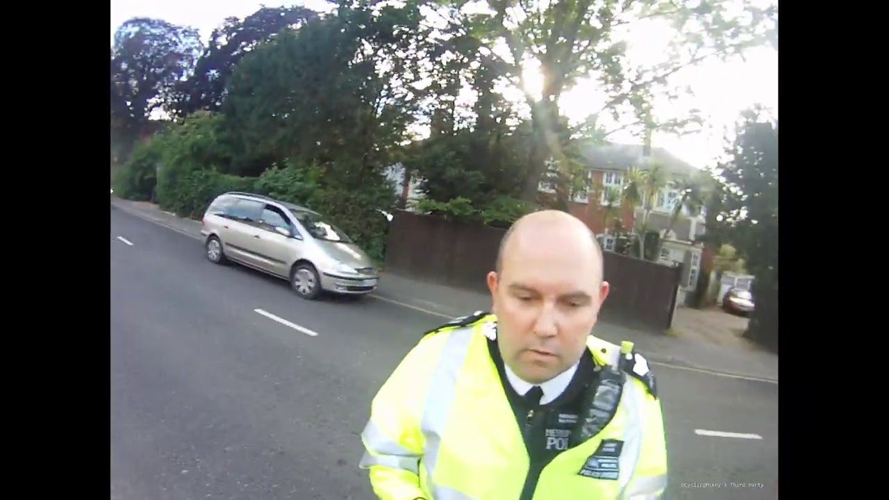 Police Stop Cyclist After Close Passing Him BX13DCZ