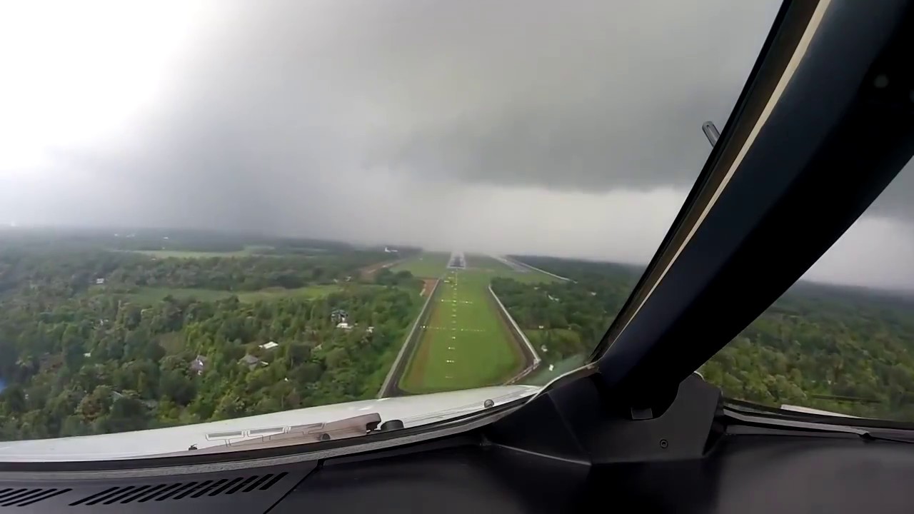 Beautiful scene of flight landing in rain at Cochin International Airport