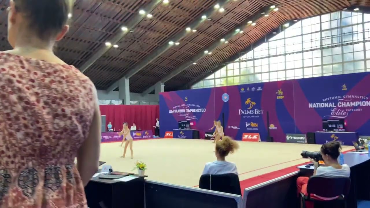 Club group routine under age 12 rhythmic gymnastics.