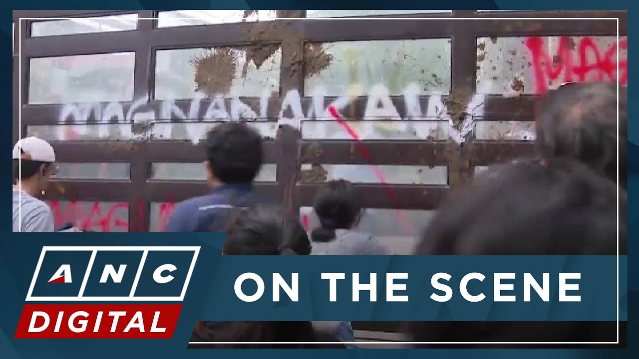 LOOK: Protesters pelt gate of St. Gerrard Construction with mud, scrawl 'magnanakaw' | ANC