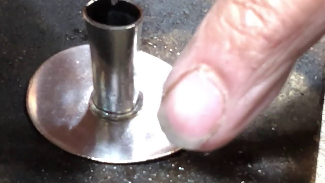 Soldering together silverware bud vases