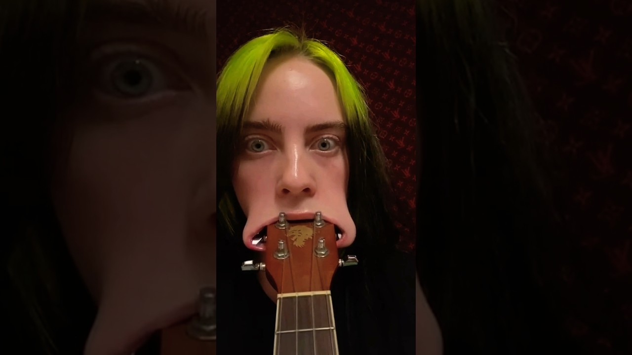 Билли Айлиш помещает в рот всю головку укулеле&hellip; ДВАЖДЫ 😂 #шорты #billieeilish