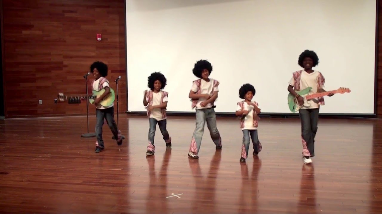 Westside Club singing and dancing to 