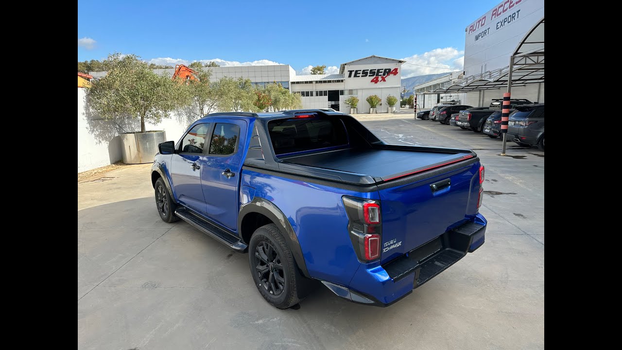 At www.tessera4x4.com: Isuzu Dmax 2023+ with OEM stylish bar combined with Ultimate Tessera Roll+