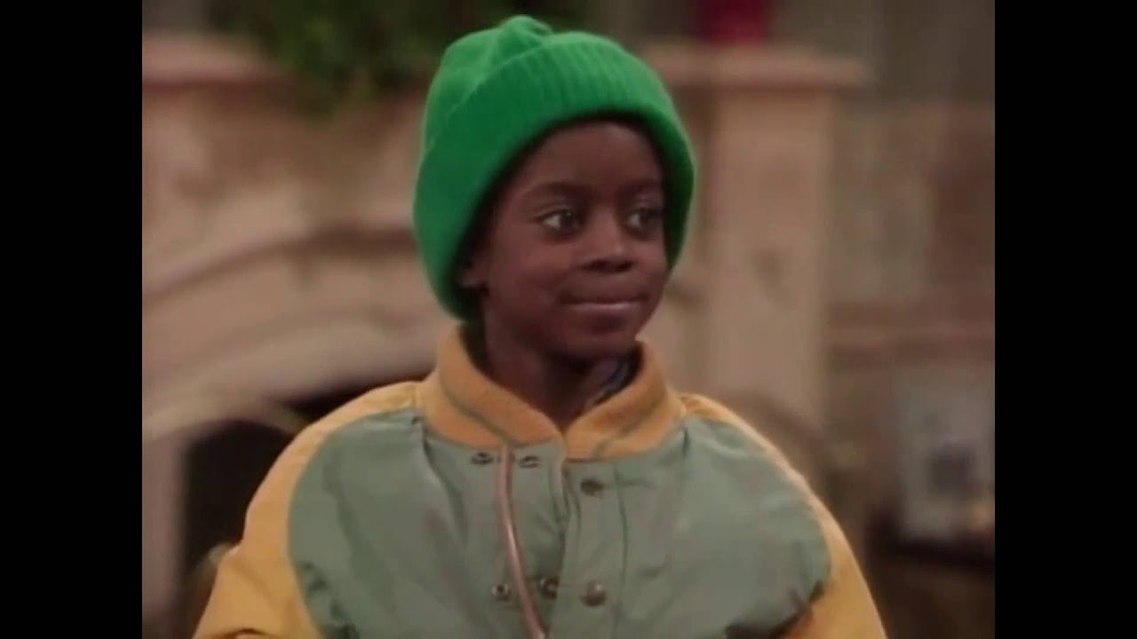 Rudy and Kenny (Bud) argue over the roles of men and women
