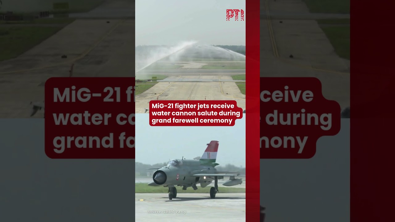 MiG-21 fighter jets receive water cannon salute during grand farewell ceremony