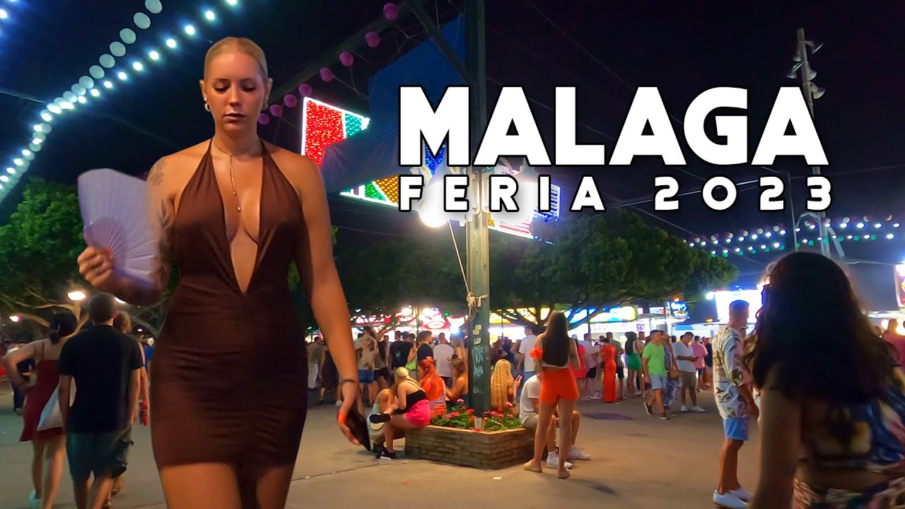 Malaga City Spain REAL DE LA FERIA MÁLAGA 2023 Busy Night Summer August Fair Costa del Sol Andalucía