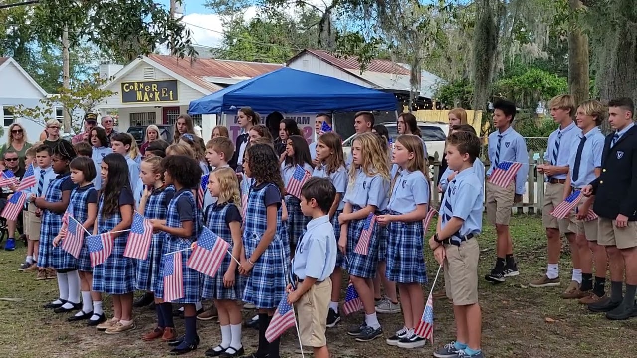 Veritas Classical School in St. Augustine sings the National Anthem at the Lincolnville Festival