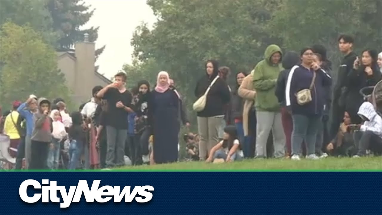 Edmonton families wait in line overnight for backpack drive