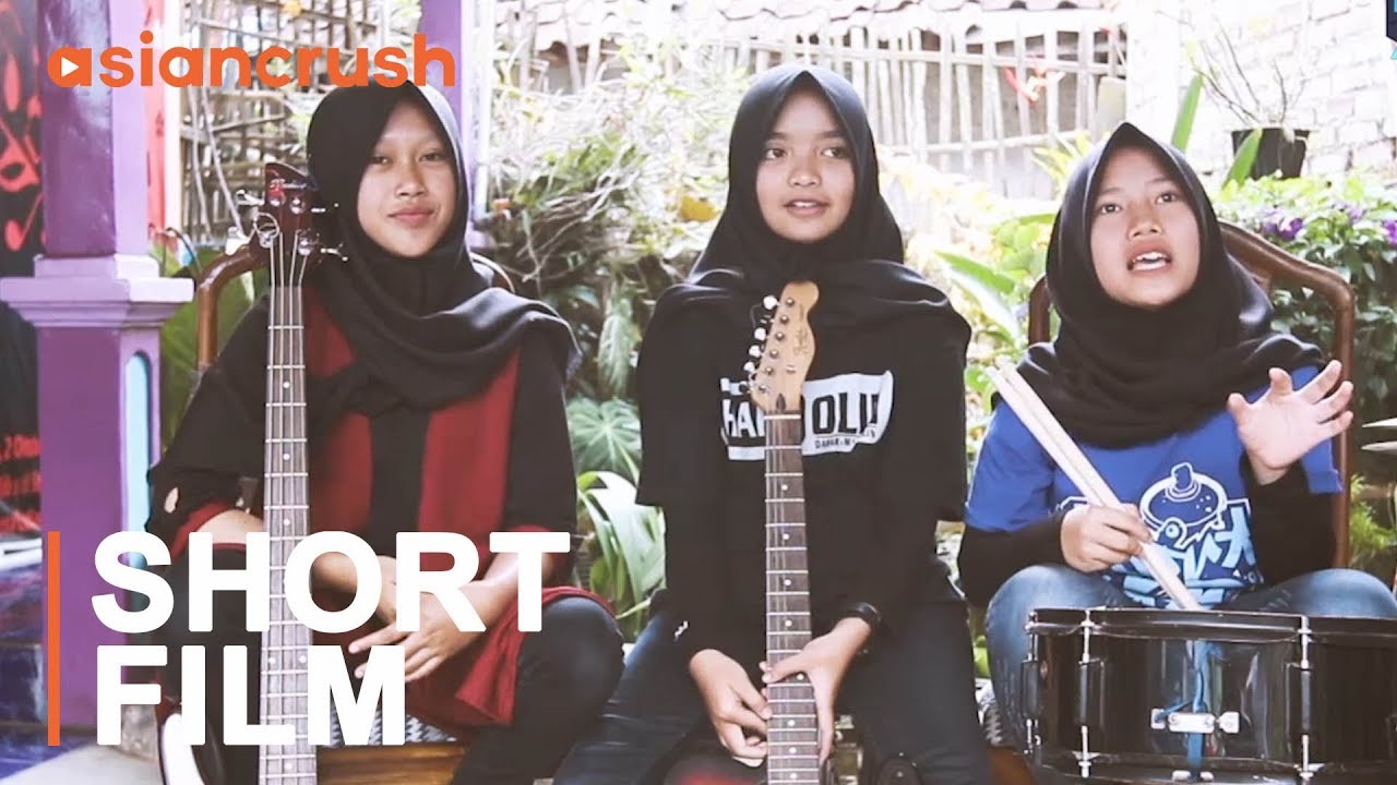 Teen hijabi metal band smashes stereotypes with rock and roll in Indonesia | Inside Asia