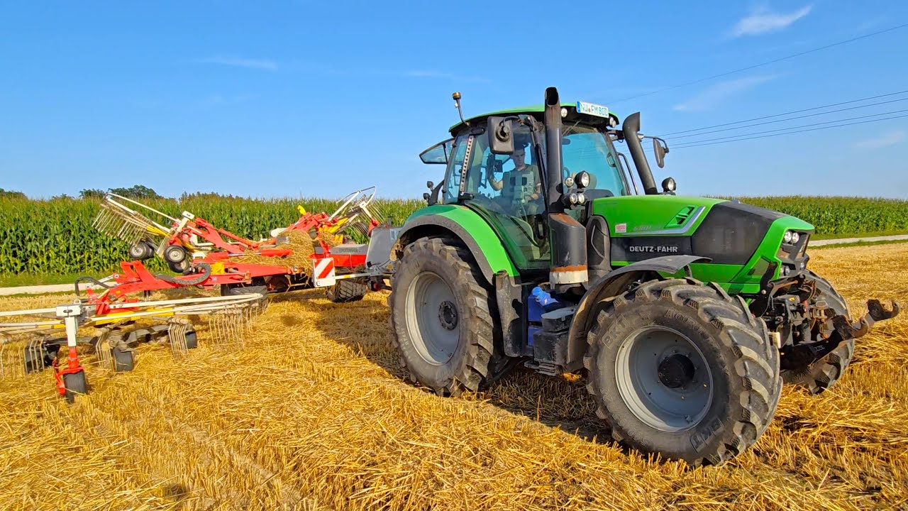 Deutz TTV 6180 beim Stroh schwaden mit Pöttinger TOP 1403 C in Bayern 2024
