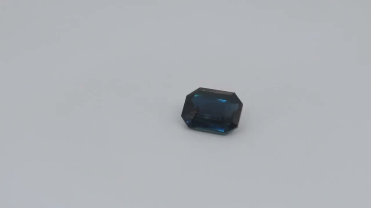 0.64ct blue sapphire emerald cut