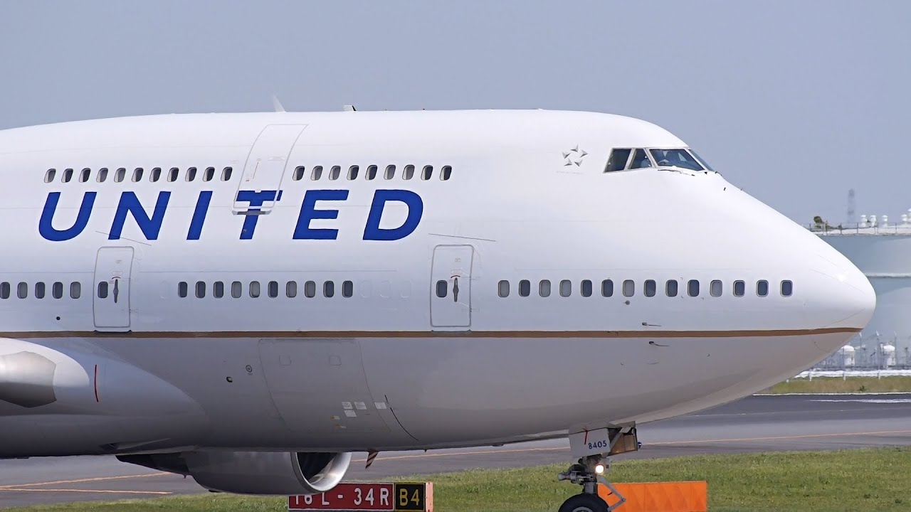 United Airlines Boeing 747-400 N105UA Landing at NRT 34R