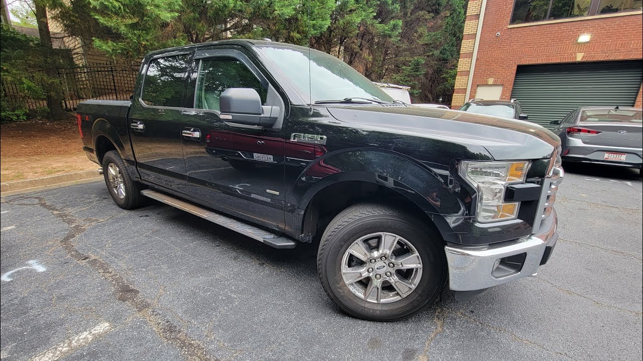 Чёрный Ford F150 4x4 2016 года выпуска: сканирование OBD, вид снизу. Видео предпродажной проверки...