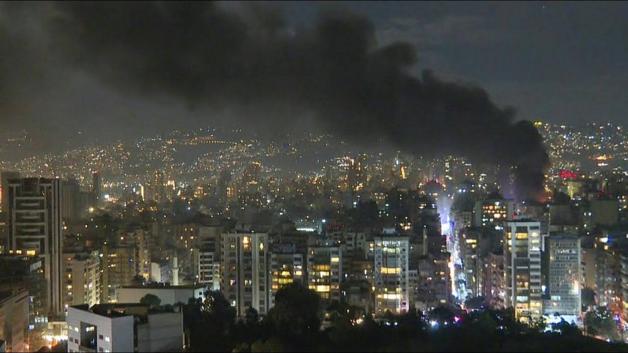 Thick cloud of smoke rises over buildings after an Israeli strike hits centre of Beirut | AFP