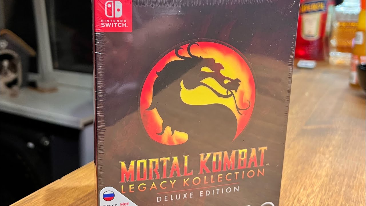 Распаковка Mortal Kombat Legacy Kollection deluxe edition Nintendo switch 