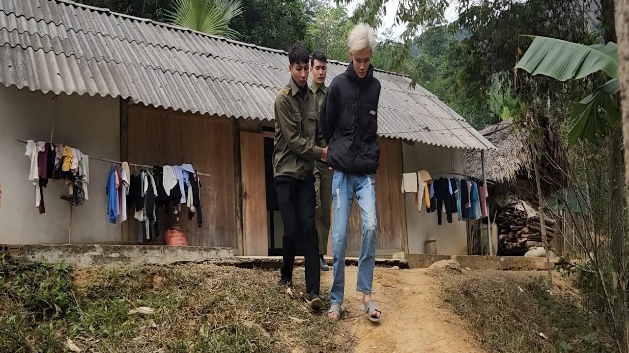 The criminal who stole money was arrested by police and taken to the station for questioning.