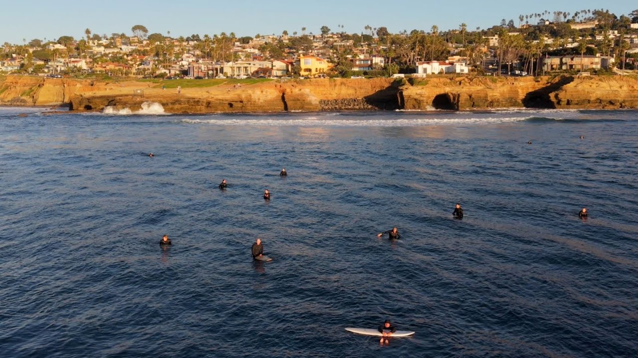late afternoon surfing off Sunset Cliffs in 4k