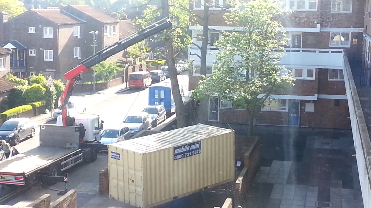 Truck Crane Lifting Up Container