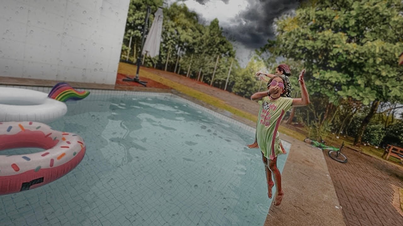 PULAMOS NA PISCINA NO MEIO DE UM TEMPESTADE !