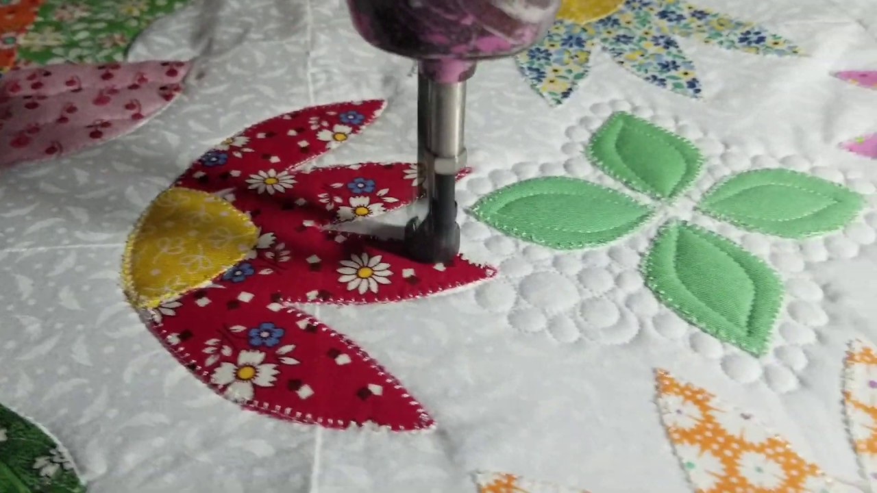 Feathers in Unique shape blocks longarm quilting hand guided quilt pebbles wiggle lines custom