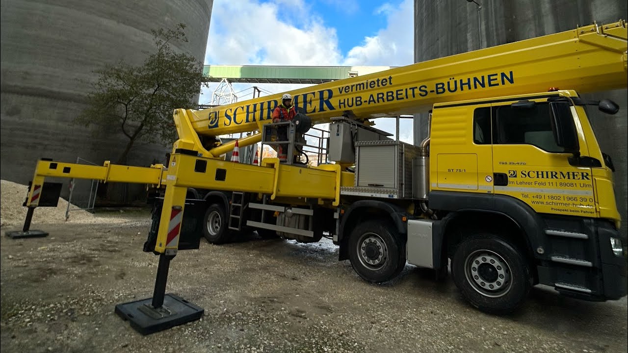 Big man lift truck, hydraulic cherry picker for work in heights MAN truck