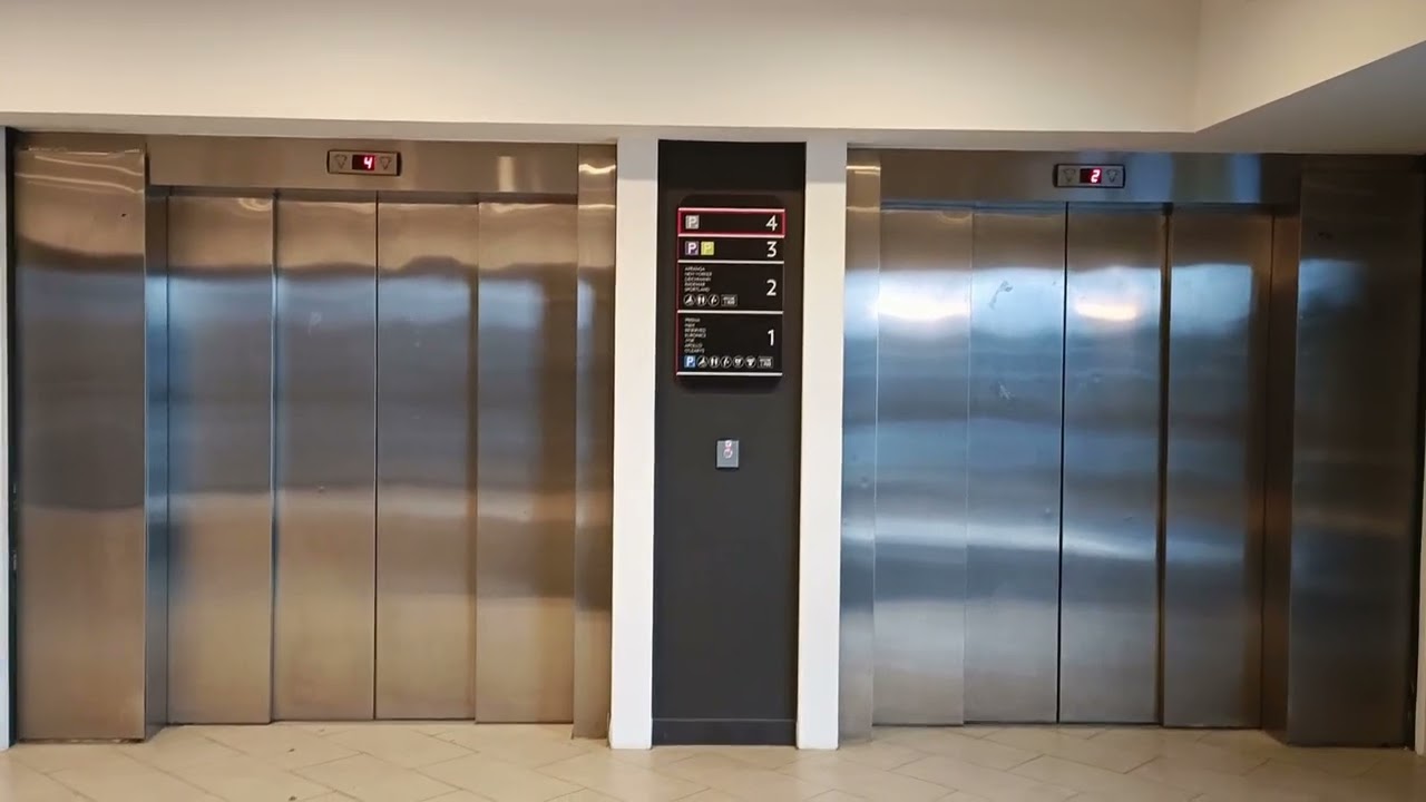 4 older-style Kone EcoDisc lifts in Kristiine Keskus Tallinn