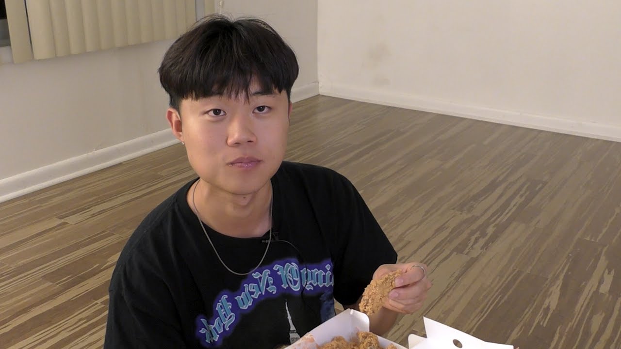 Eating Popeyes in a NYC living room