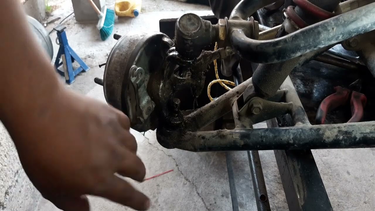 Como desarmar la suspencion de la cuatrimoto Atv150 italika