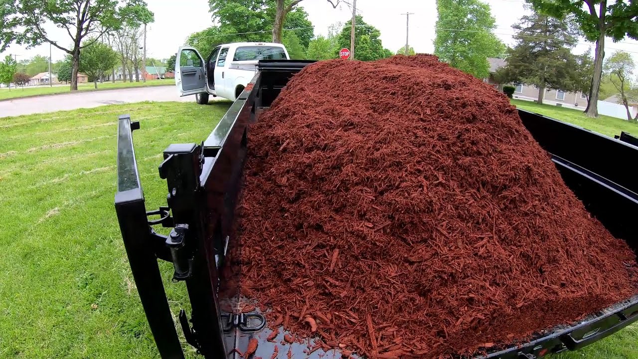 Load Trail Dump Trailer Hauling Mulch