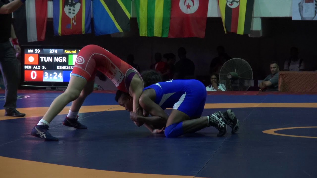 Round 1 WW - 59 kg: S. BEN ALI (TUN) v. N. DIMEJESI (NGR)