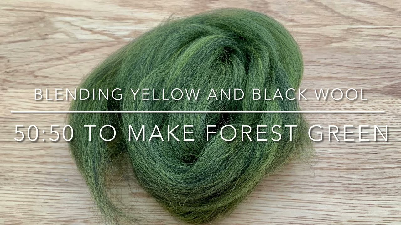 Blending yellow and black wool with mini wool combs to make forest green.