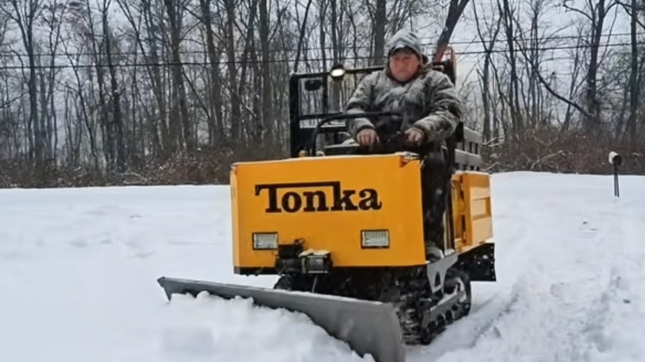 HOW MUCH SNOW CAN A IRD25  DUMPER PLOW?!!!