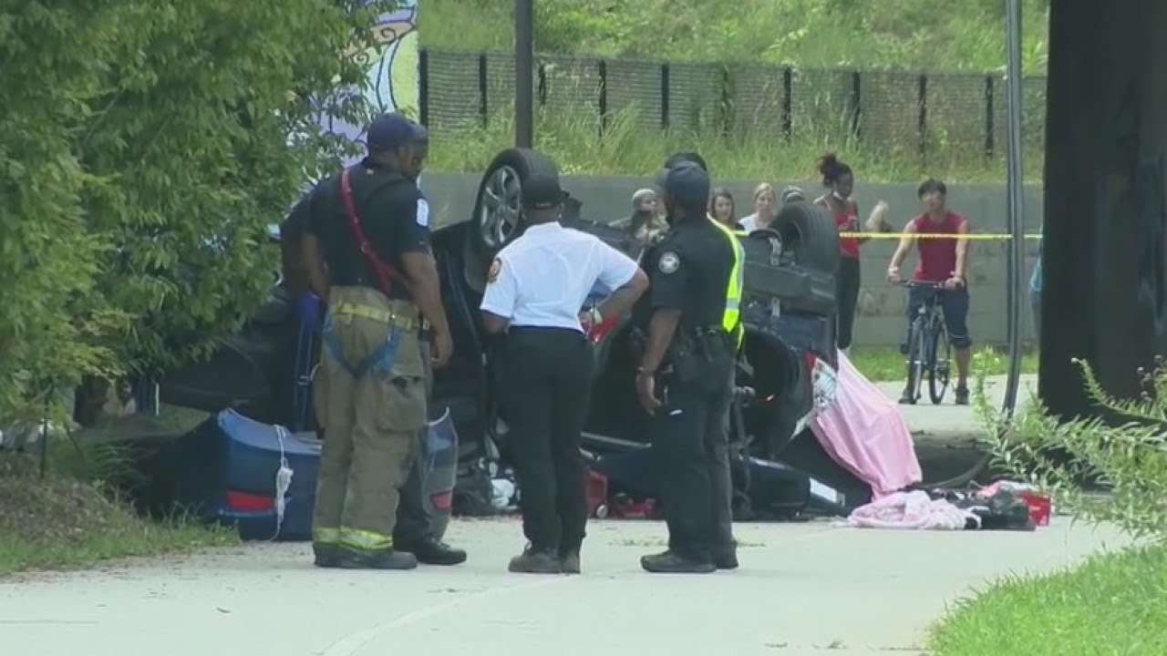 Vehicle careens over bridge onto BeltLine path
