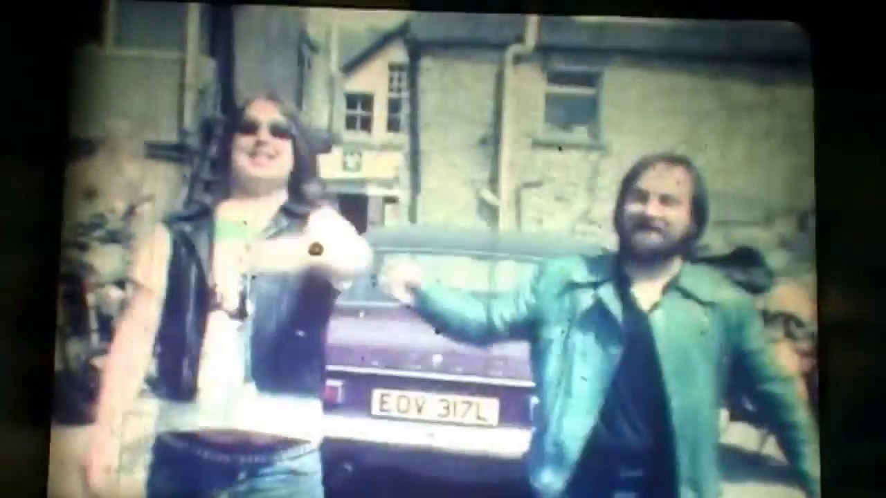 Fat Mike and Galen fighting outside  Bridgend used spares workshop Nolton Street Bridgend 1980