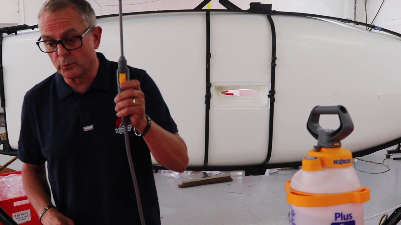 Performing a Leak Test on a Topper hull.