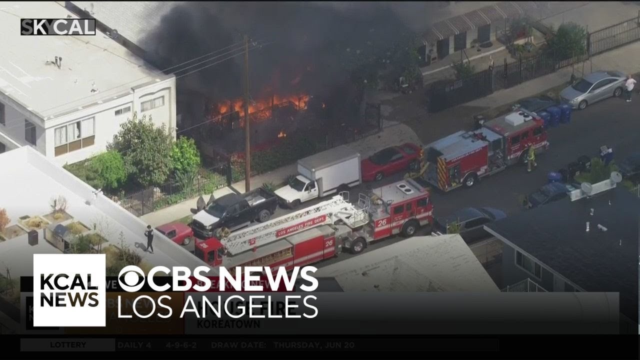 Firefighters work to put out Koreatown house fire