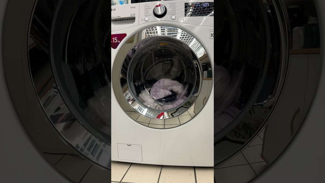 Lave linge Lg 15 kg. Programme coton 60 degr&eacute;s, option intensif. Cycle complet 