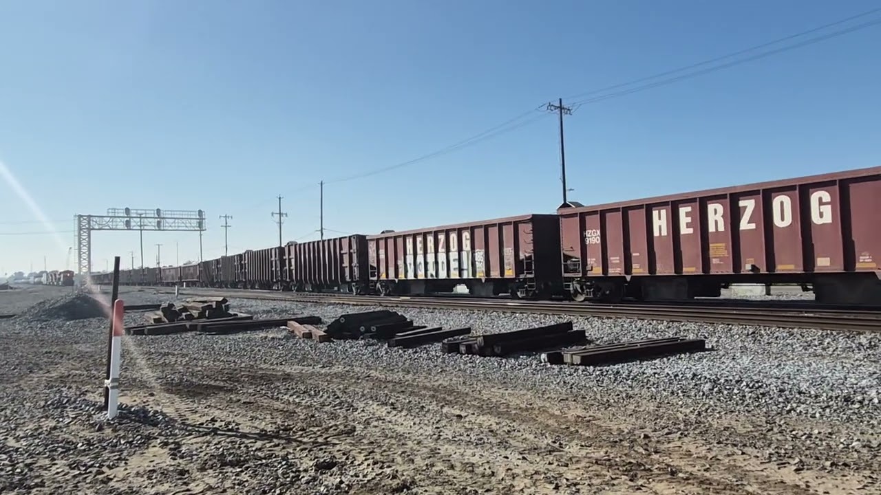 BNSF Herzog train leaving Calwa yard Fresno ca