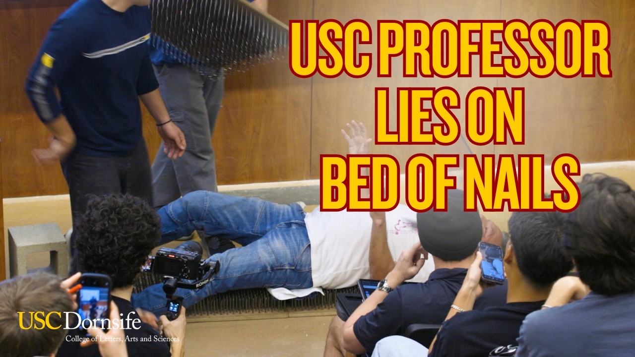 USC Professor Lies on Bed of Nails