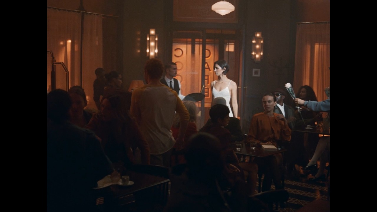 Spotted: Gracie Abrams lighting up a Parisian caf&eacute;.