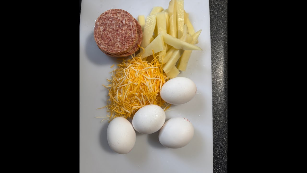 Thao cooked breakfast and fed the four dogs, then took them outside to play in the cold snow.