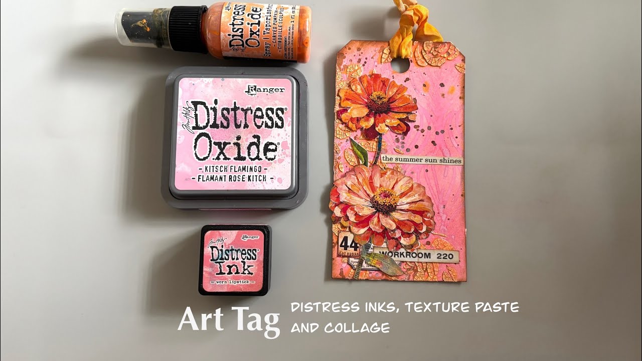 Mixed media art tag using distress inks, texture paste, and collage.
