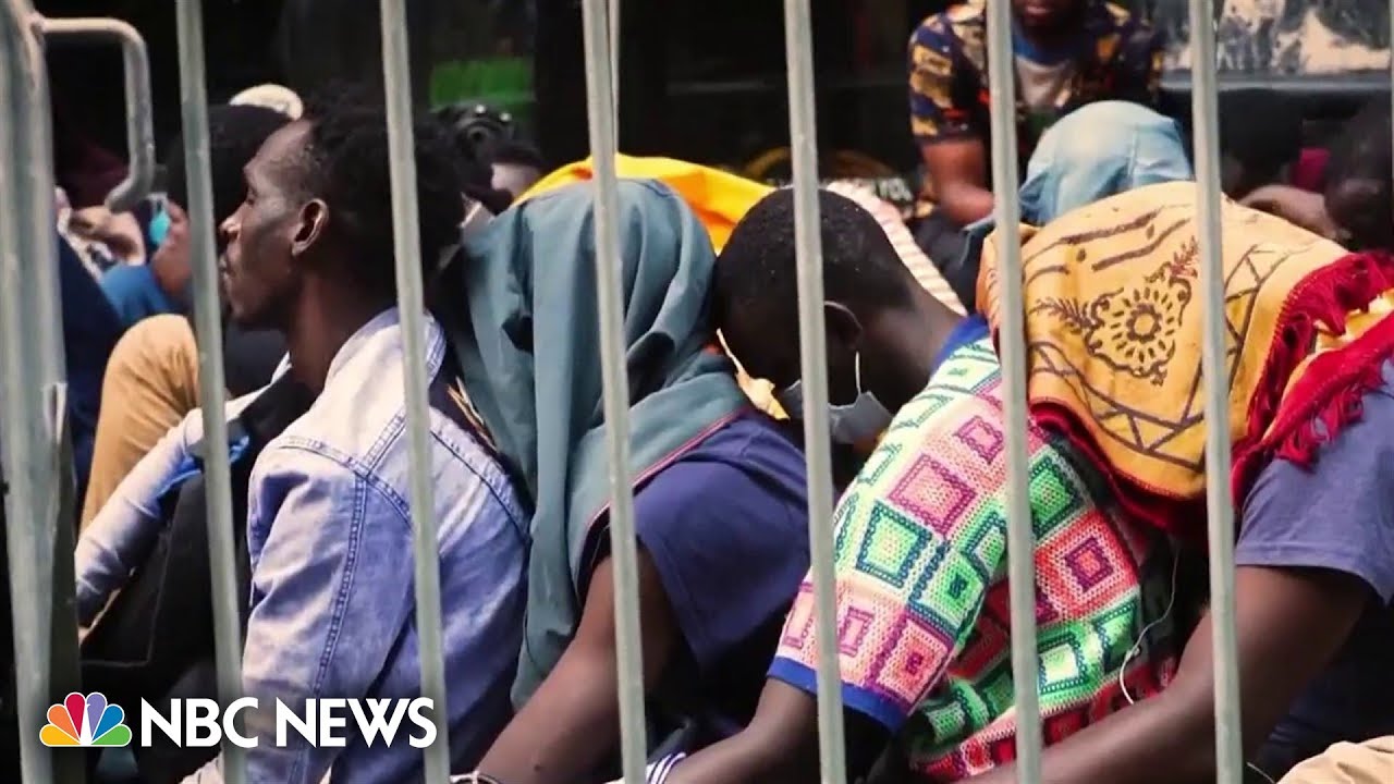 Authorities move migrants sleeping outside a NYC hotel to a church