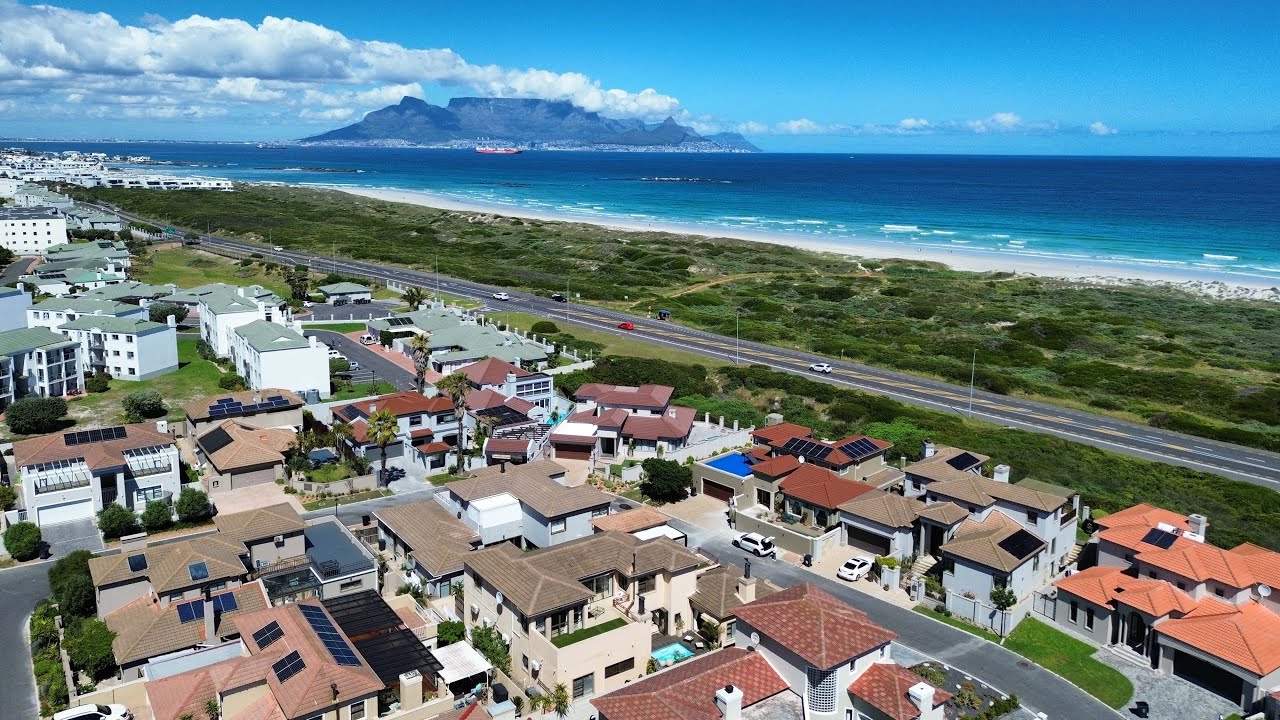 Spacious Coastal Home Steps from Blouberg Beach.
