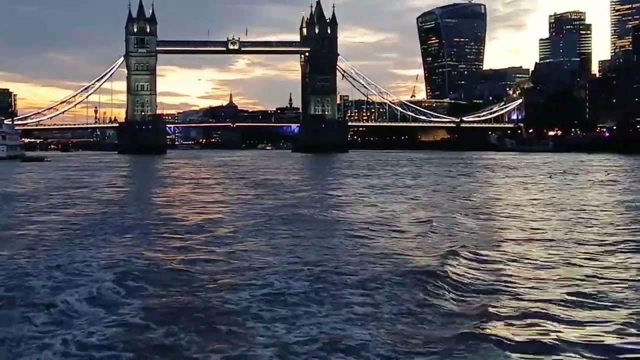 Passing Under Tower Bridge at Sunset