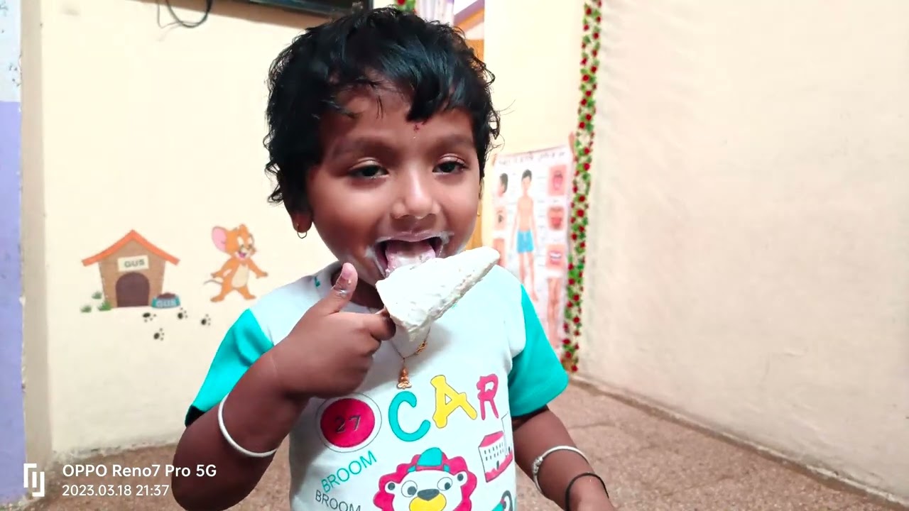 Shaurya eating kulfi